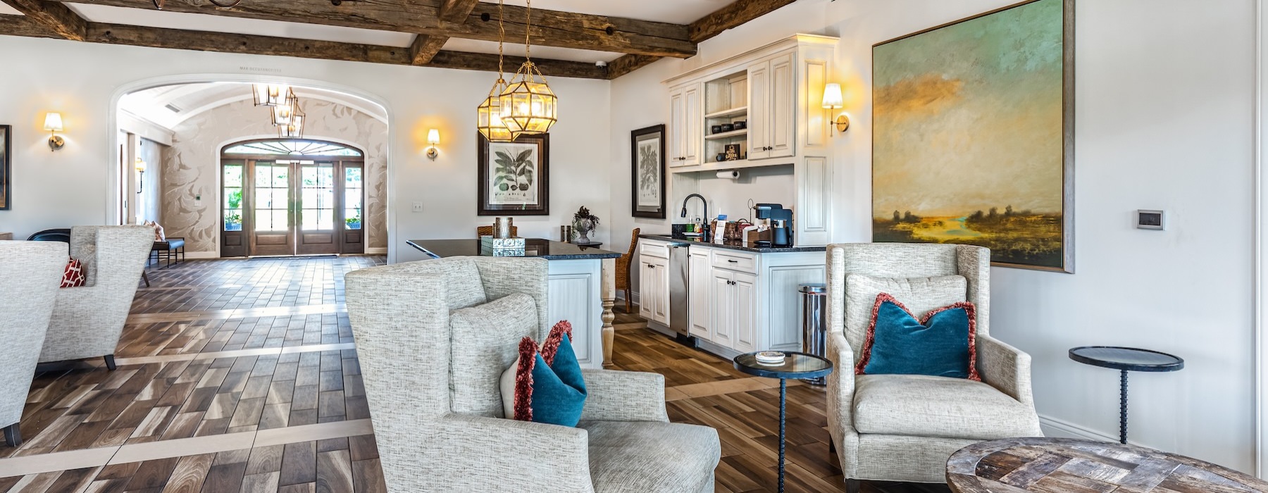 a clubroom with a table and chairs