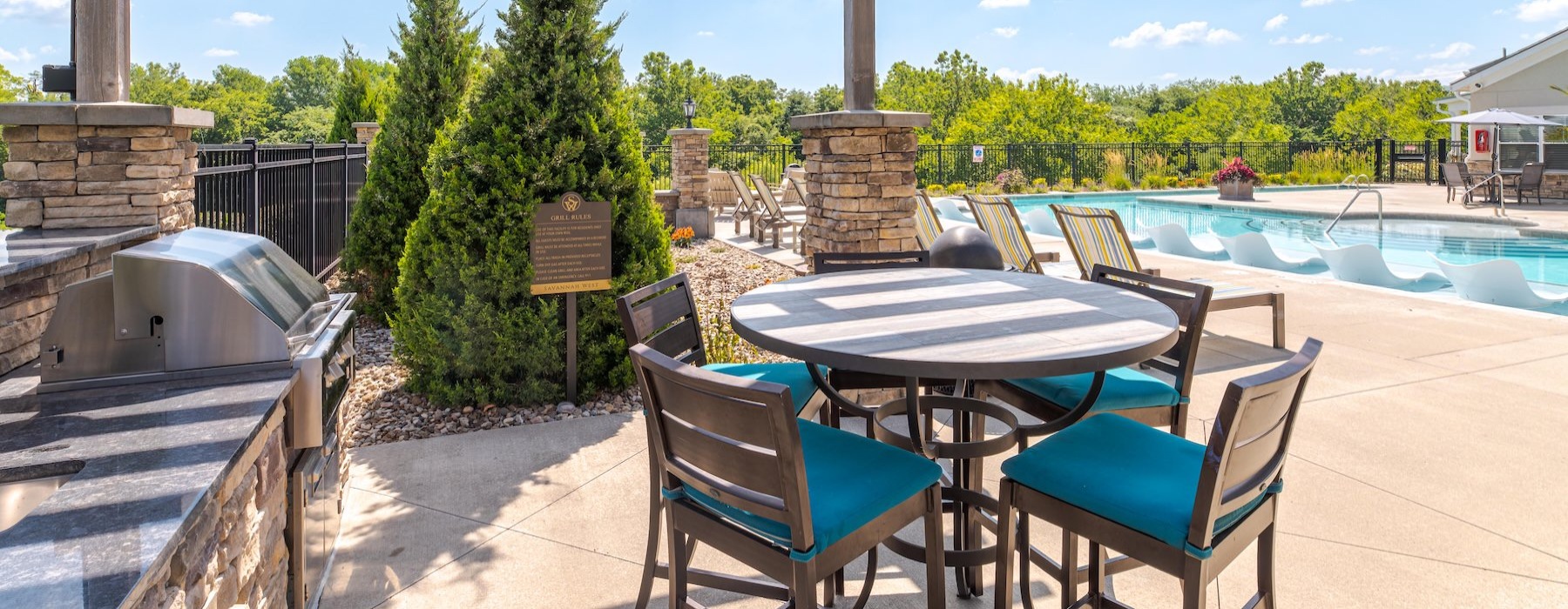a grilla rea with tables and chairs